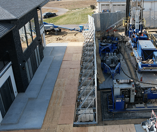 Image of sound barriers in front of a building to protect from noise